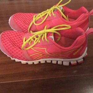 Women’s Reebok pink and yellow RealFlex shoes